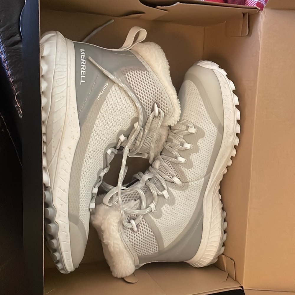 white and grey waterproof winter ankle boots